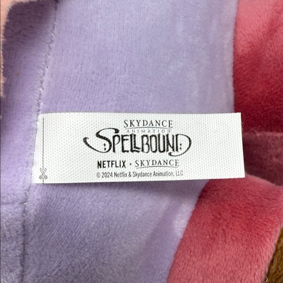 Oracle Sunny from “Spellbound”. Purple Plush Toy with Yellow and Pink Outfit - Picture 7 of 8